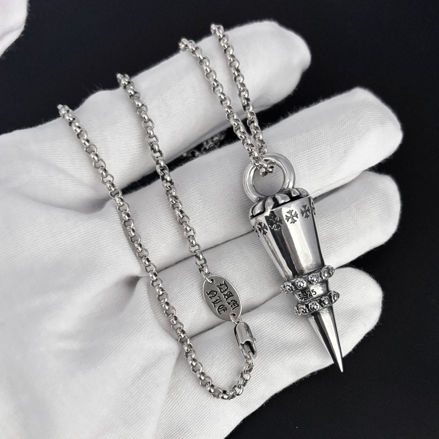 Chrome Hearts distressed cross rivet bullet pendant