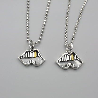 Chrome Hearts big mouth gold tooth necklace