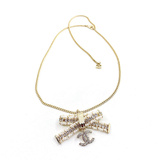 18K  Chanel Bow Tie Necklace