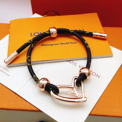 18K Louis Vuitton Heart Charm Bracelet